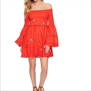 Flattering off shoulder mini dress with smocking